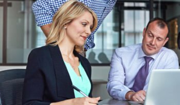 Technology and software lawyers in a meeting negotiating a contract